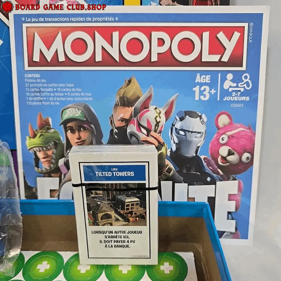 Monopoly Fortnite Edition board game featuring game pieces and community chest cards for fun family gameplay
