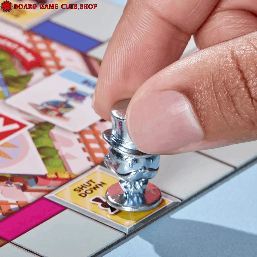 Monopoly Go game piece being moved on the board with colorful game spaces