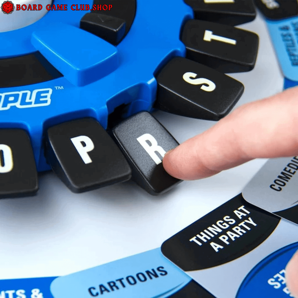 Close-up of Tapple word game with colorful game wheel and a finger pressing the letter R