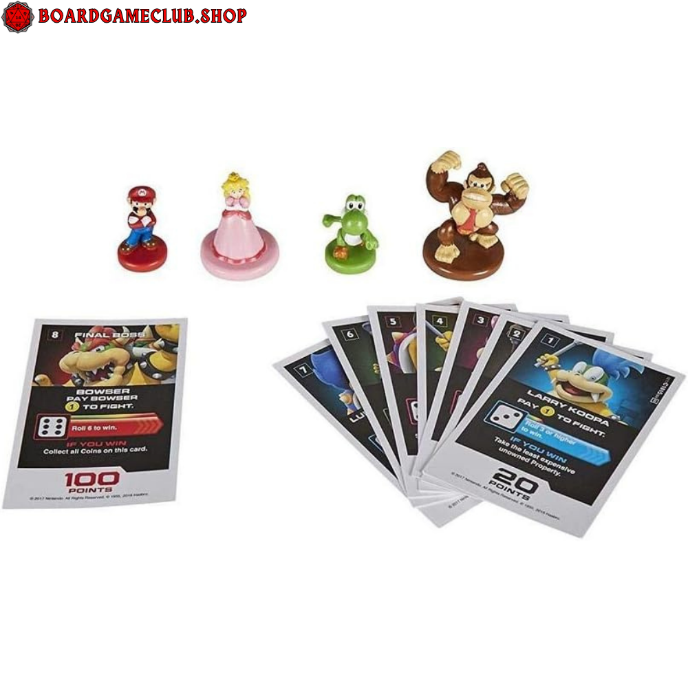 Monopoly Gamer Super Mario game pieces including Mario, Princess Peach, and Donkey Kong with game cards