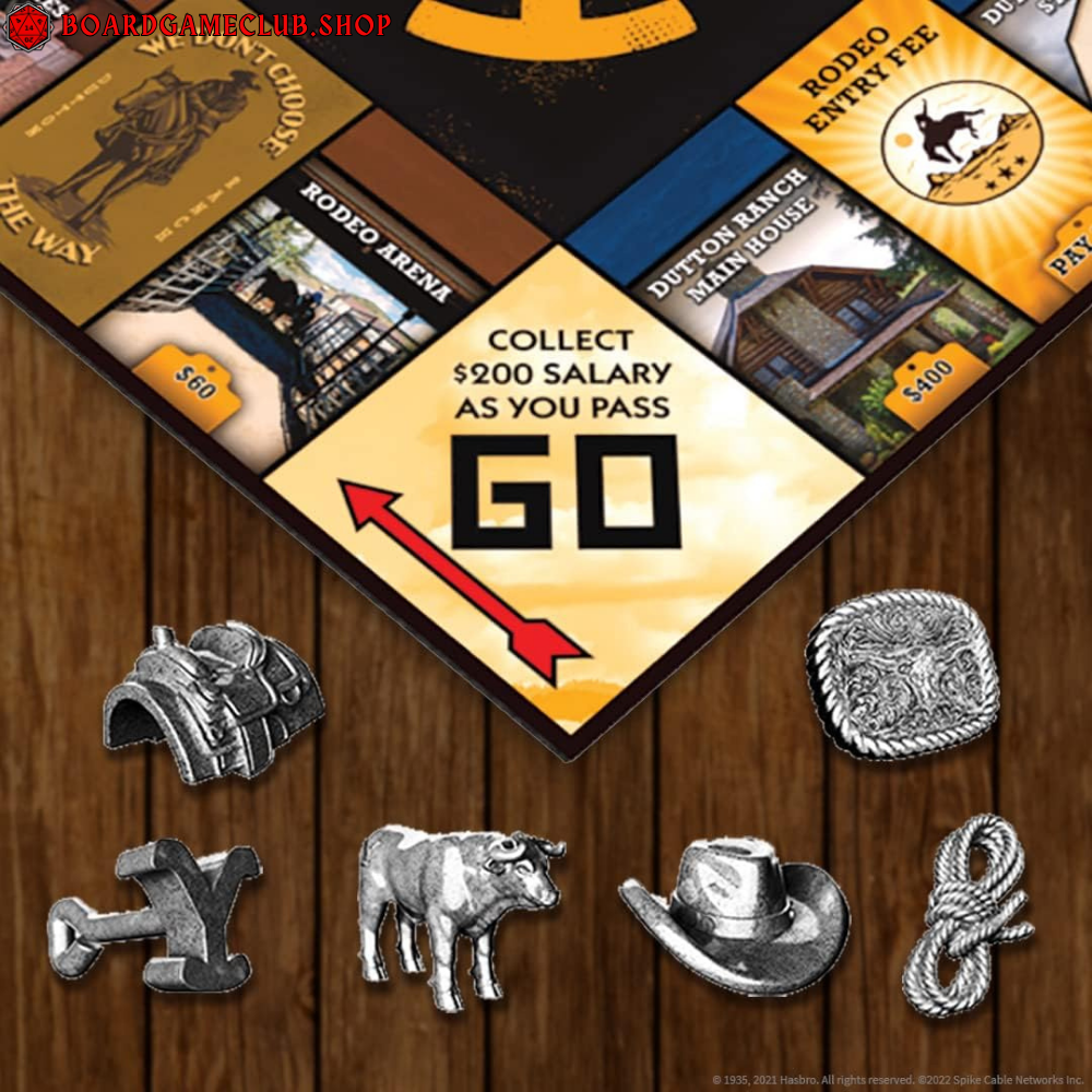 Monopoly Yellowstone board game with game pieces including cowboy hat and horse figurine